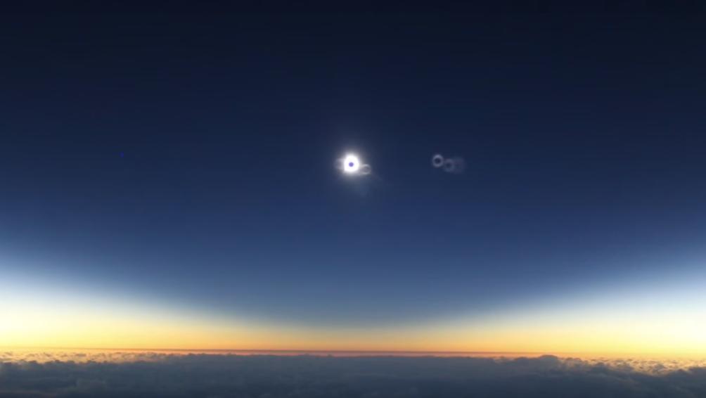 Le passager d'un avion exprime sa joie face à une éclipse solaire